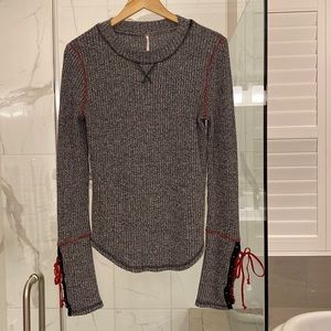 Free People waffle knit long sleeved shirt with lace up cuffs